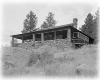 historic american homes black and white photos of a wood and stone cabin with a large porch