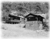 historic american homes black and white photos of a group of wood and stone cabins