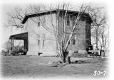 black and white photo exterior of octagon house Historic American Homes